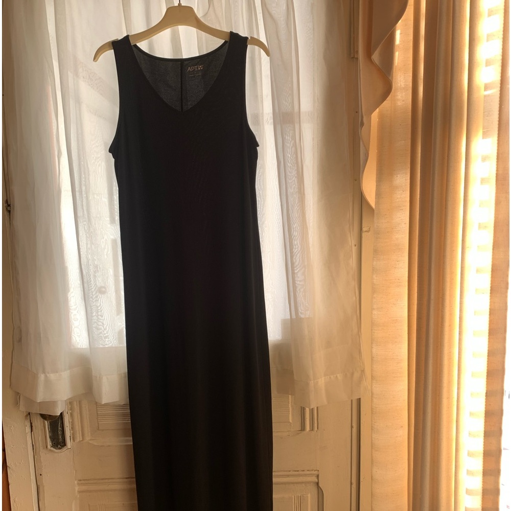 Black long straight dress. Polyester, stretchy